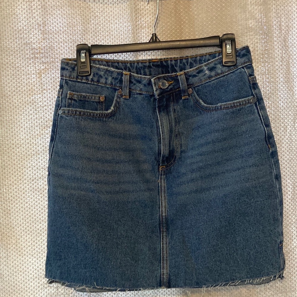 H&M denim mini skirt, never worn, tags removed.